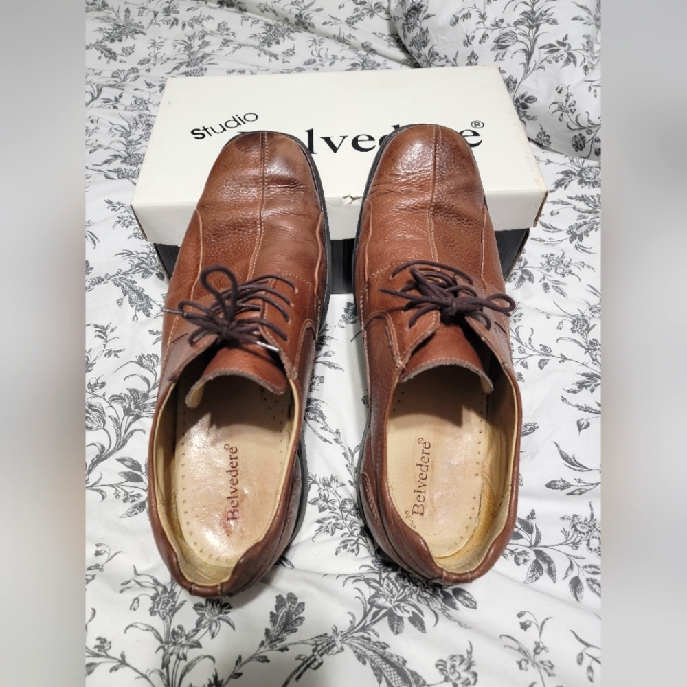 Men's brown dress shoes.